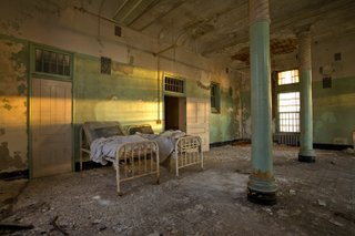 Illustration for article titled The Creepy World of Abandoned Asylums